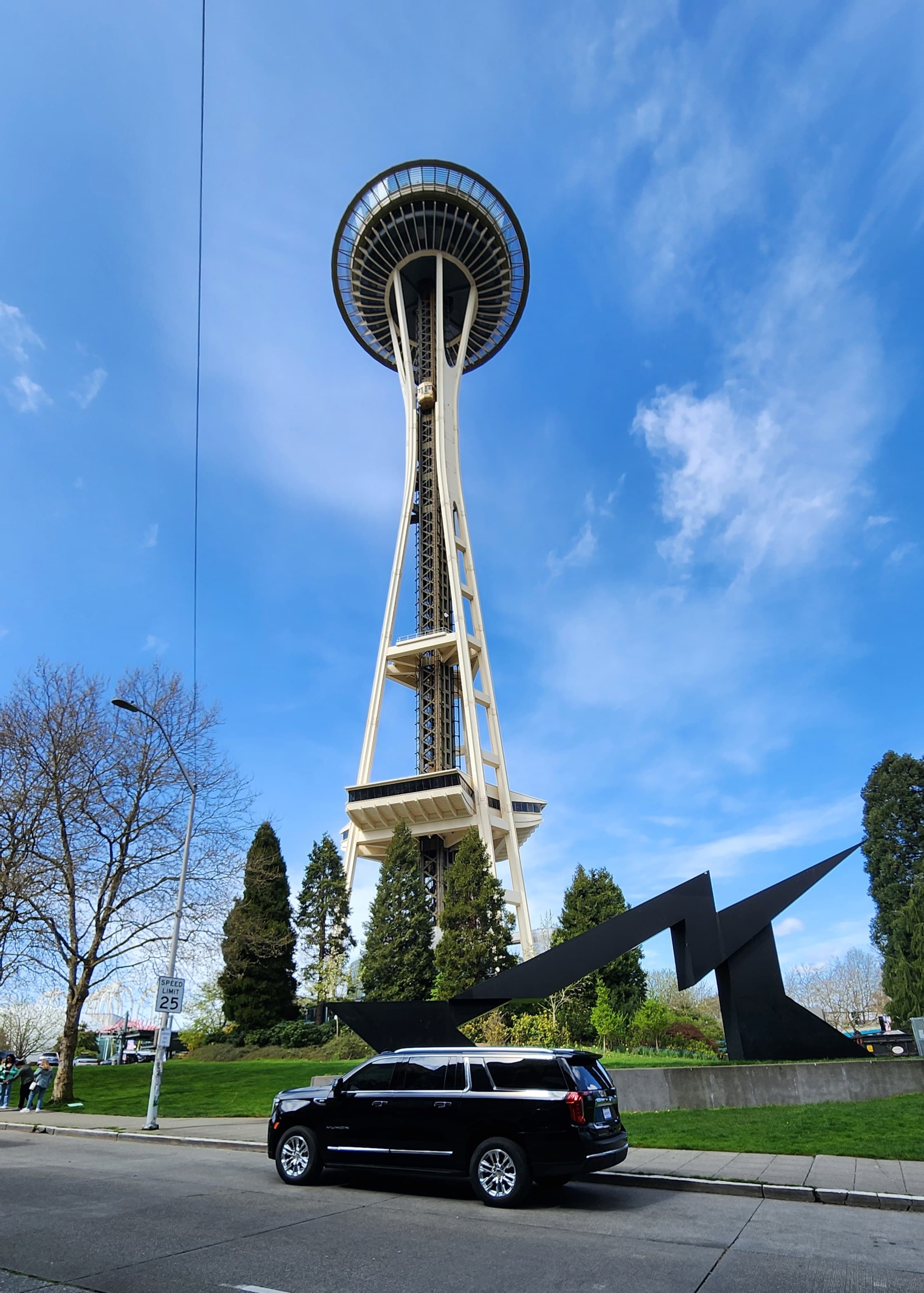 Black SUV photographed near the Space Needle in Seattle