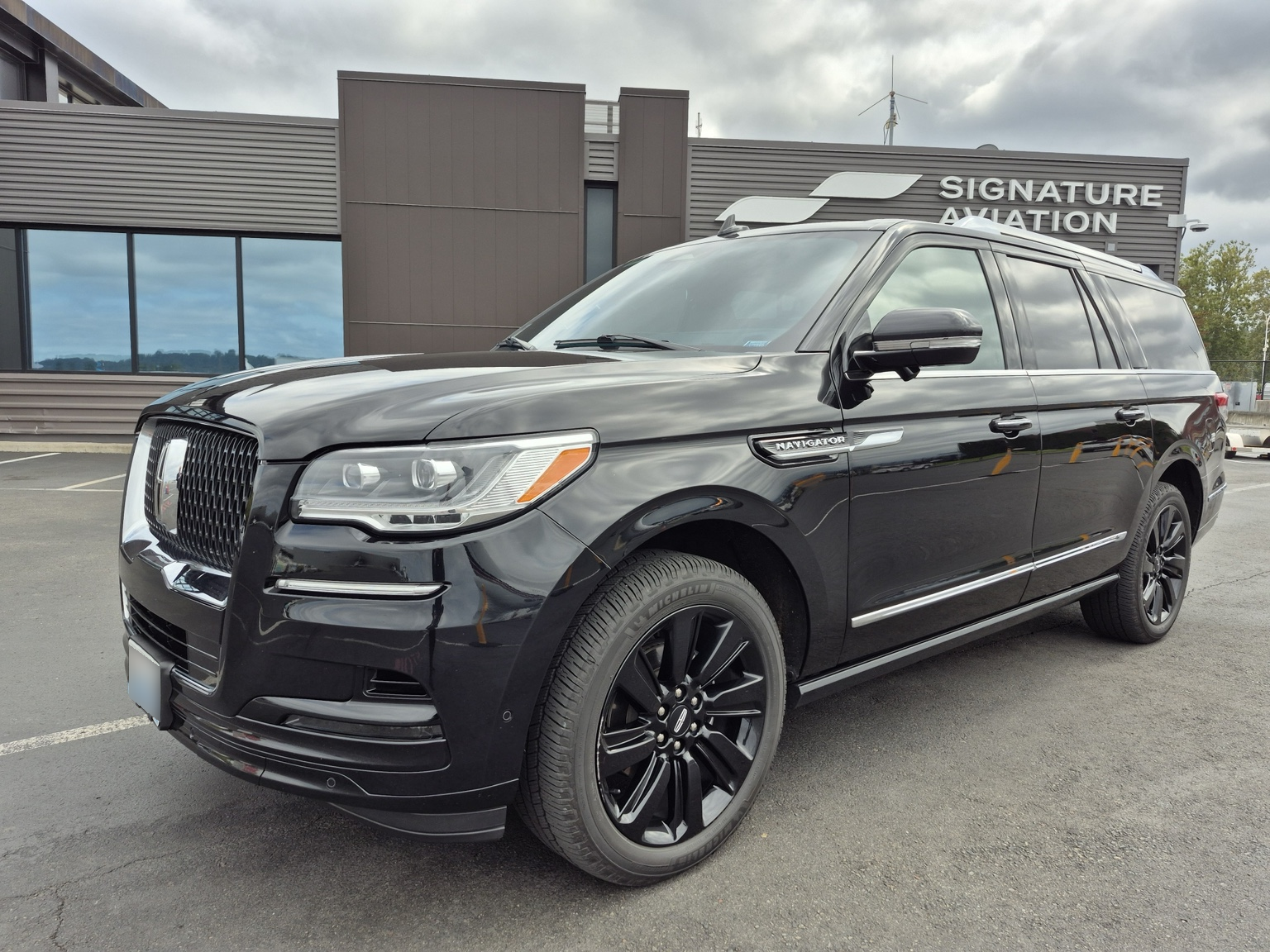 Black Lincoln Navigator at Signature Aviation