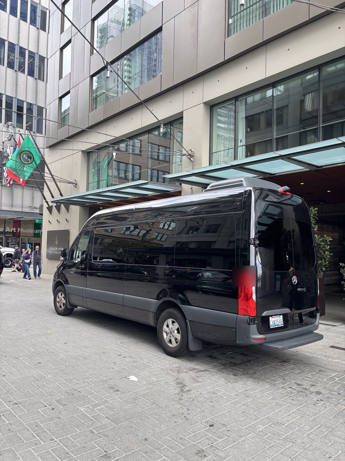 Black Mercedes-Benz Sprinter rear three-quarter view