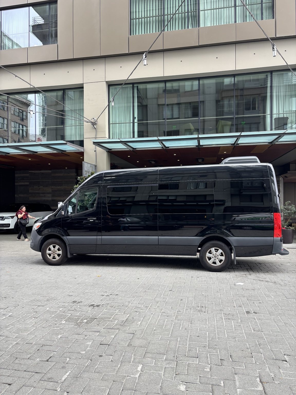 Black Mercedes-Benz Sprinter side profile